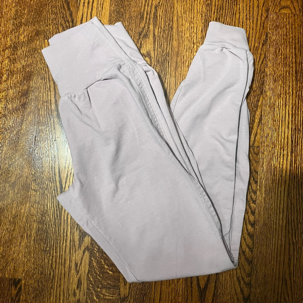 high waisted light pink side split yoga pants.